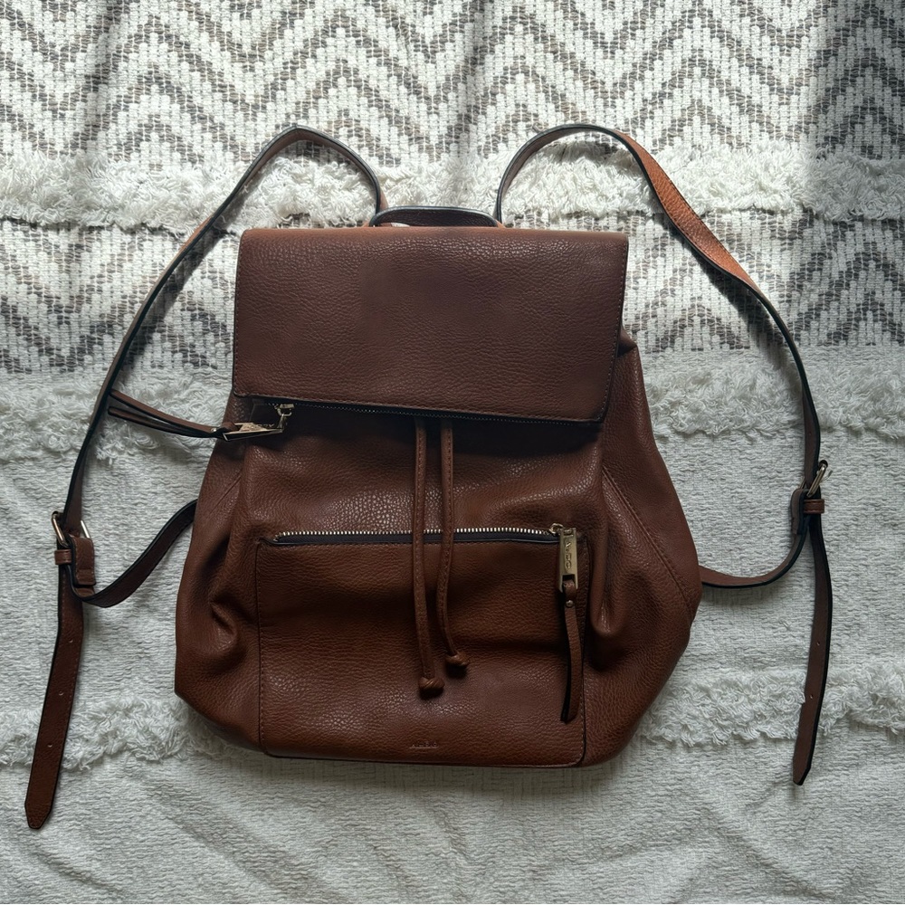 Aldo faux leather bucket bag backpack with gold hardware